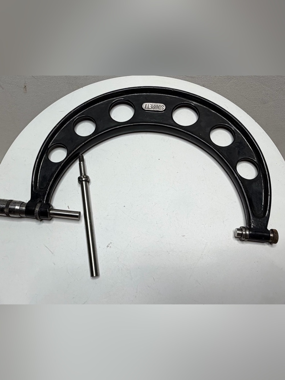Large outside micrometer with a lightweight frame and interchangeable anvils.